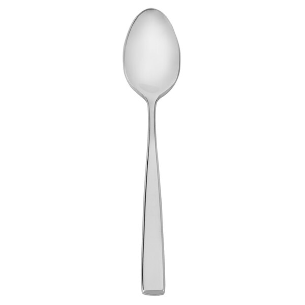 A close-up of a Walco stainless steel silver spoon.