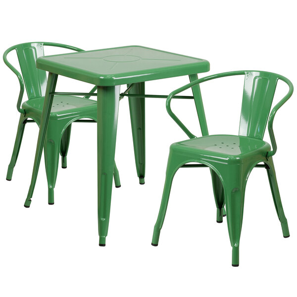 A green metal Flash Furniture table with 2 arm chairs.