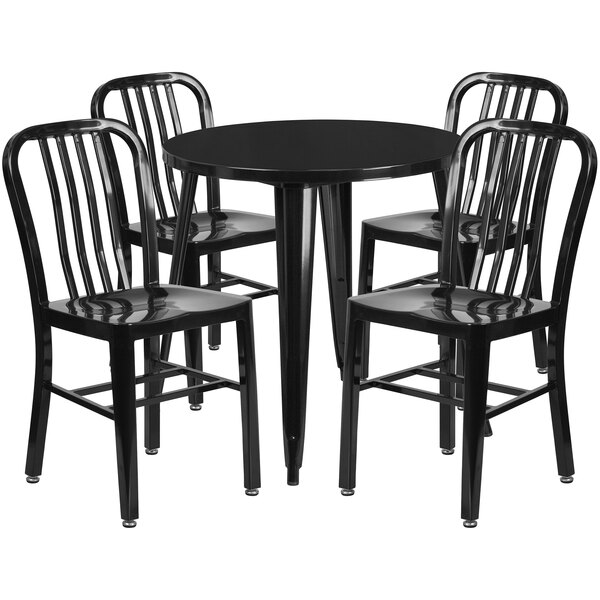 A black metal Flash Furniture table with four black chairs with vertical slat backs.