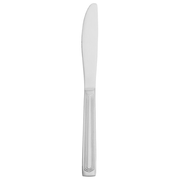 A silver Walco stainless steel dinner knife with a black handle.