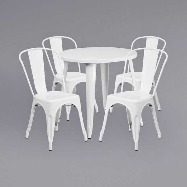 A white Flash Furniture table and chairs set.