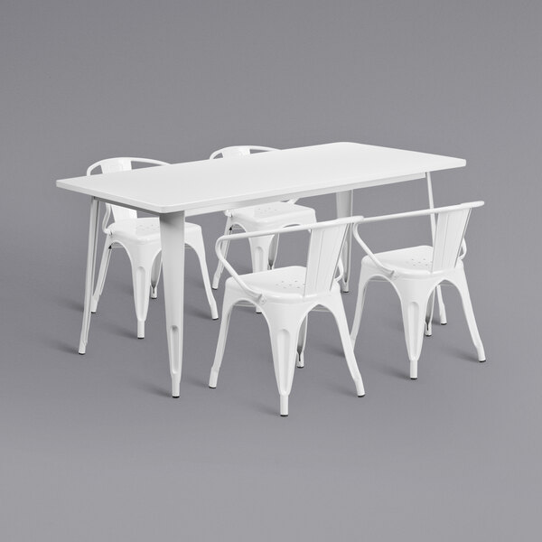 A white rectangular metal table with four white metal arm chairs.
