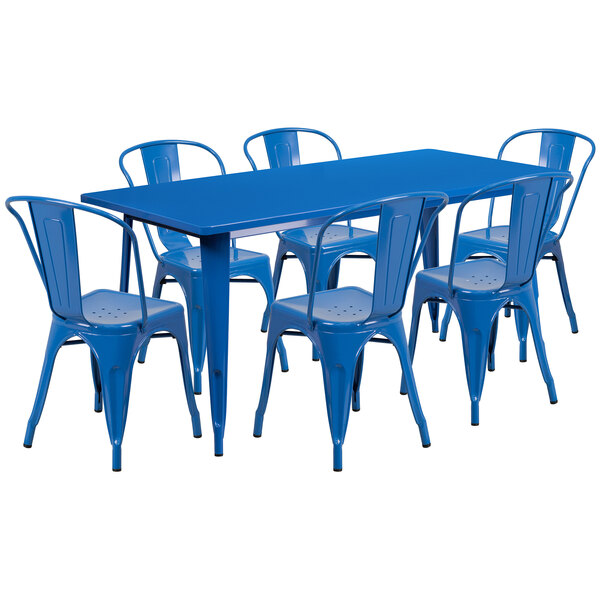 A blue metal rectangular dining table with blue chairs.