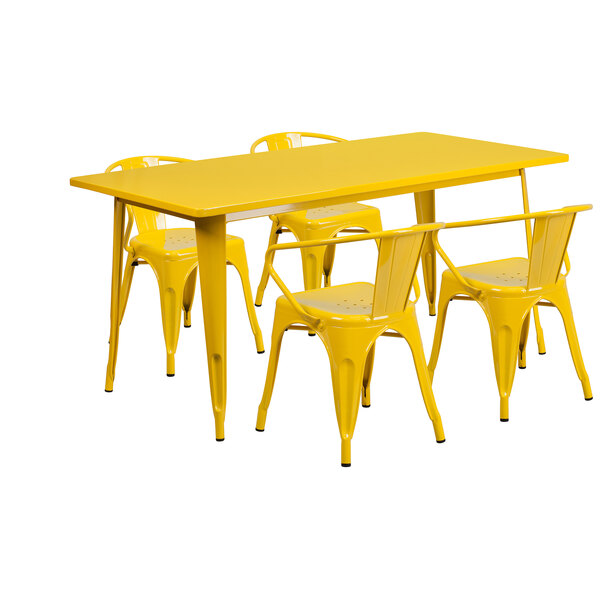 A yellow rectangular metal dining table with chairs set.