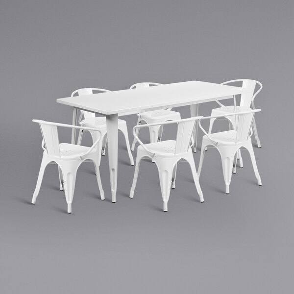 A white rectangular metal table with six white metal chairs.
