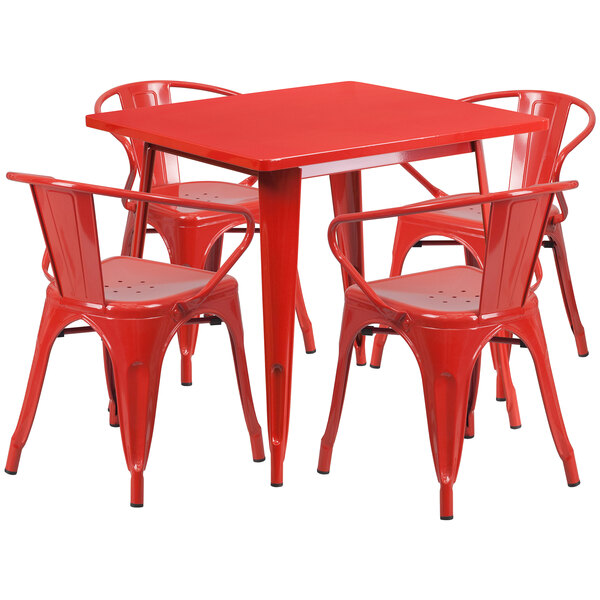 A red metal Flash Furniture table with four red chairs.