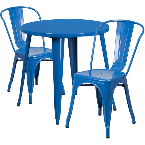 A blue metal table with two chairs on a blue surface.