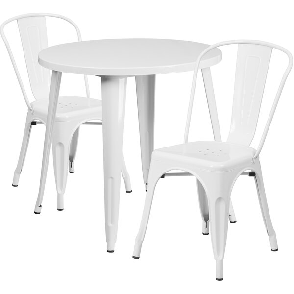 A Flash Furniture white metal table and chairs set.
