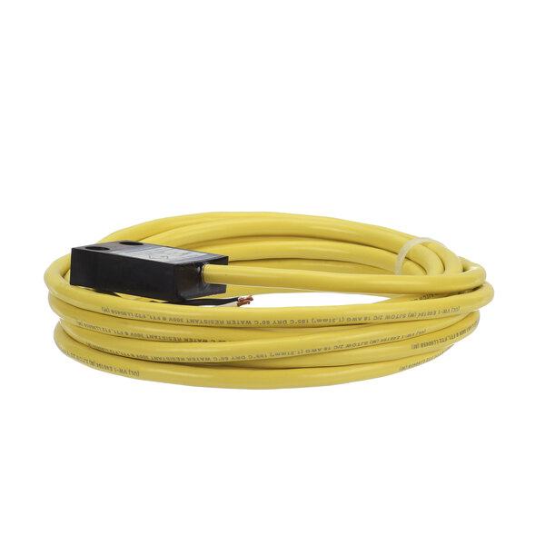 A yellow cable with a black rectangular object and electrical connector.