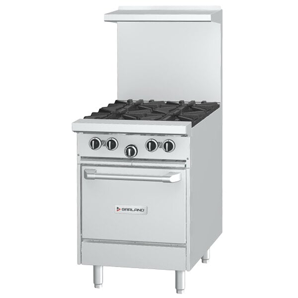 A stainless steel Garland commercial gas range with two burners and a space saver oven.