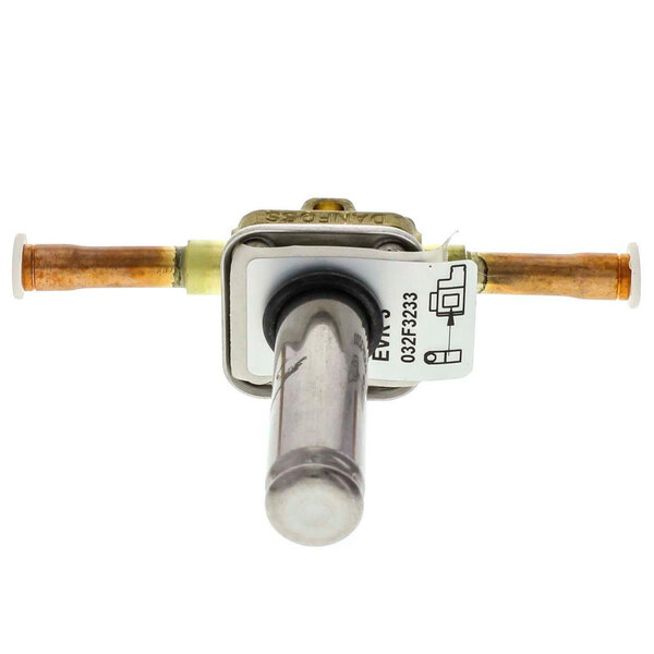 A close-up of a Carpigiani Danfoss body valve solenoid with a brass knob and metal handle.