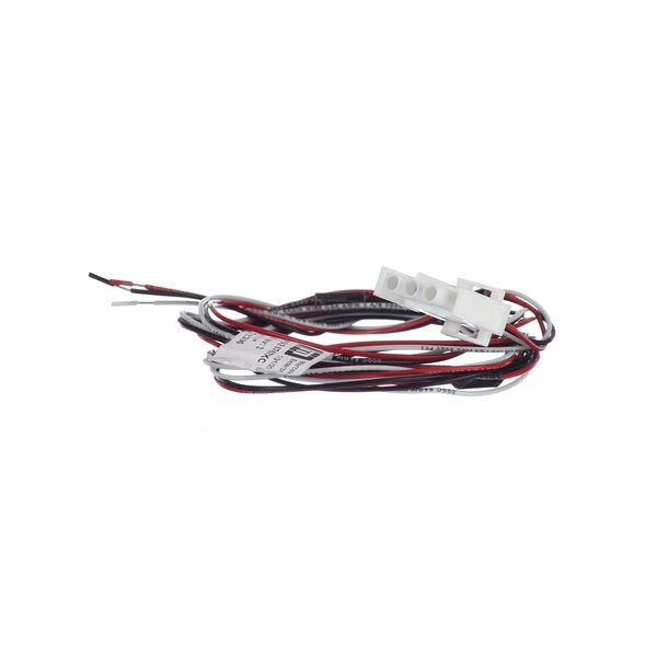 A white wire with red and black wires connected to a Garland US Range Reed Switch.