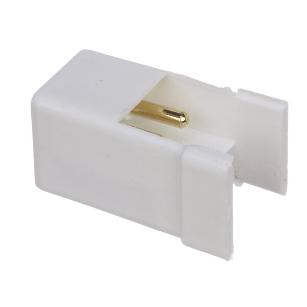 A white plastic Duke pin connector with gold pins.