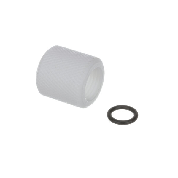 A white plastic J Antunes drain cap with a black o-ring.