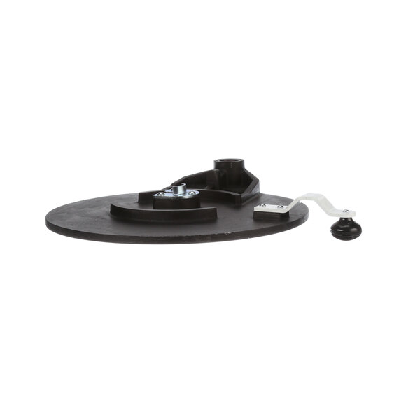 A black plastic circular lower platen with a metal screw.