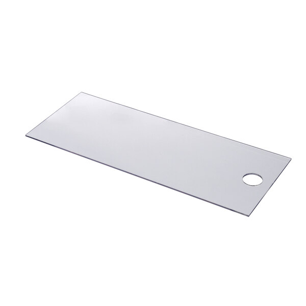 A white rectangular plastic sheet with a hole in the middle.