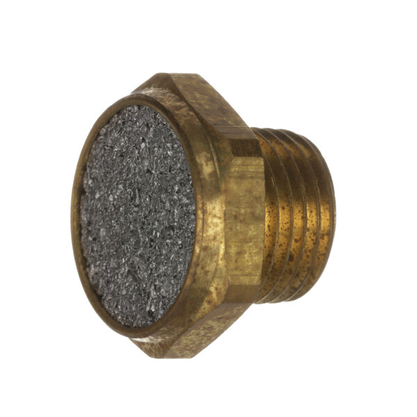 A close-up of an Edlund brass silencer nut with a grey surface.