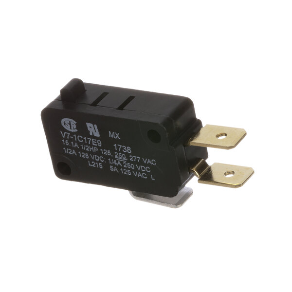 A black Jackson Micro Switch with two gold wires.