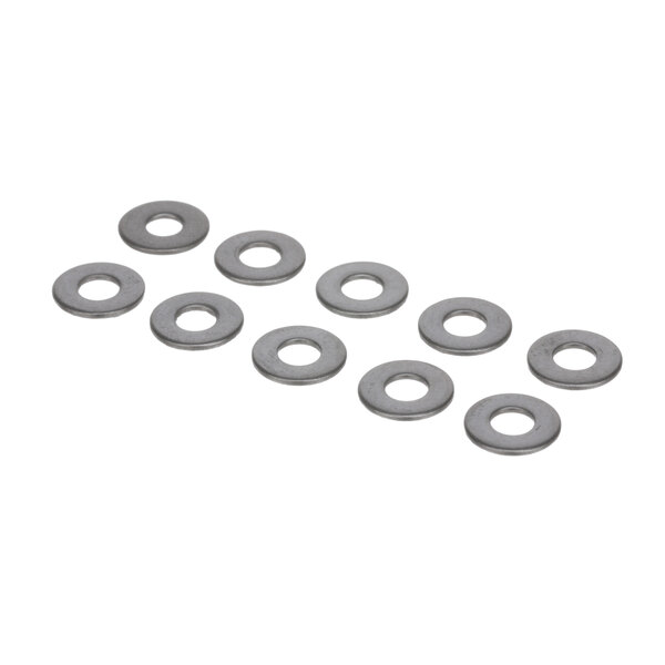 A row of silver metal washers on a white background.