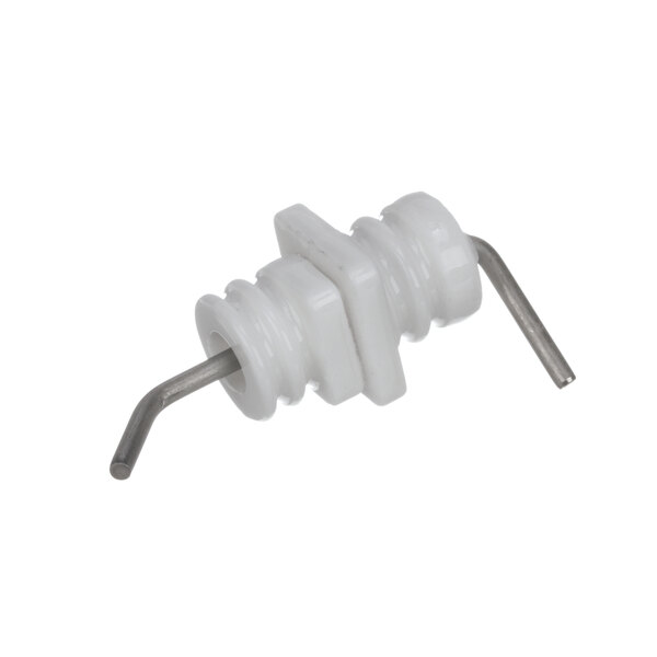 A white plastic object with a metal rod and two bent wires.