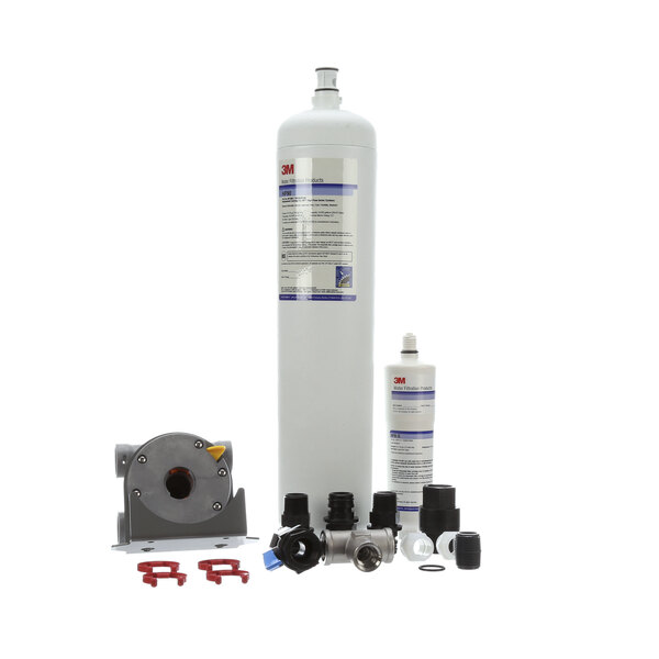 A group of white Lancer Cuno water filter cylinders and parts.