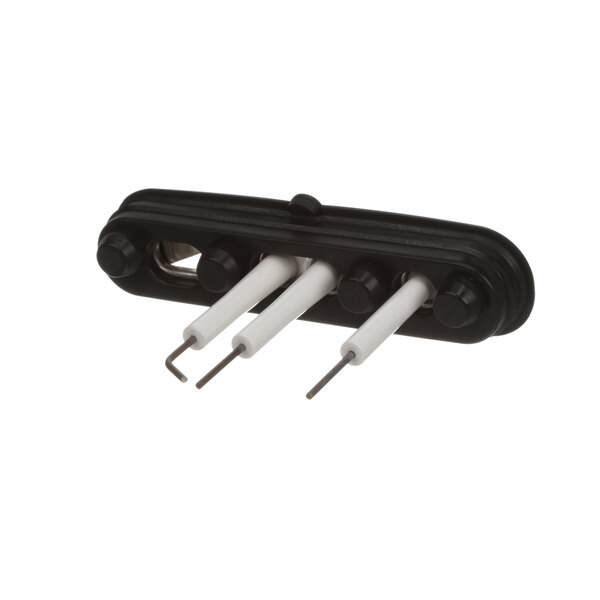 A black and white tool with a black plastic holder and three white electrodes.
