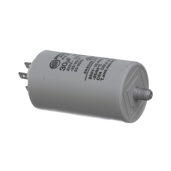 A white Blodgett capacitor with black text.
