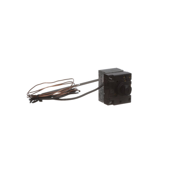 A black electrical switch with wires attached.