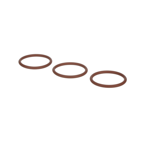 A row of three brown round Frymaster o-rings.