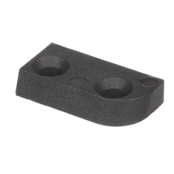 A black plastic Hobart sharpener mount spacer with holes.