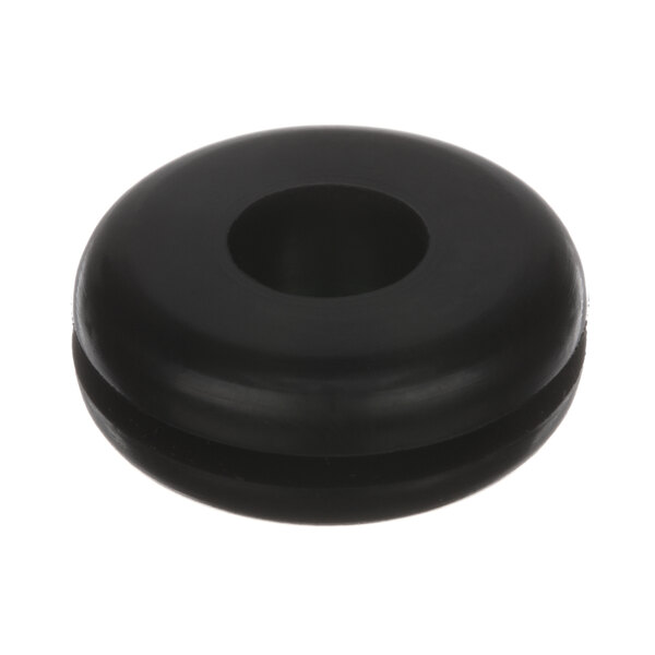 A black rubber Mannhart grommet with a hole in it.