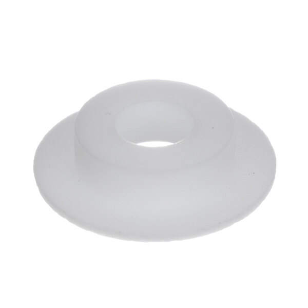 A white plastic round object with a hole in it.
