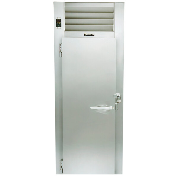 The stainless steel door of a Traulsen Correctional Roll-Thru Heated Holding Cabinet with a metal handle and glass window.