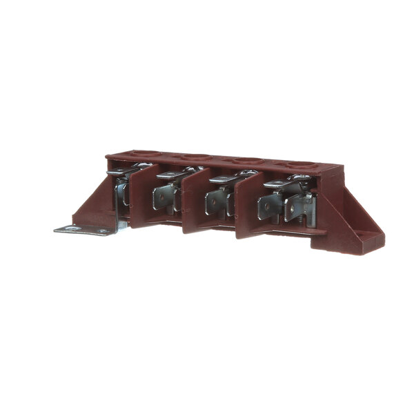 A brown plastic Kelvinator terminal block with metal parts and three bolts.