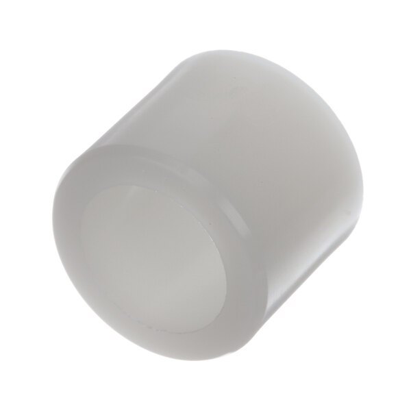 A white plastic cylinder with a hole.