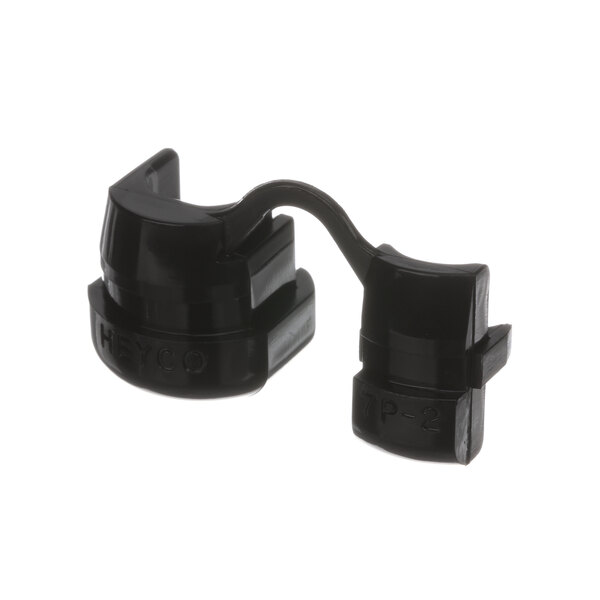 A pair of black plastic Mannhart cable relieve bushings.