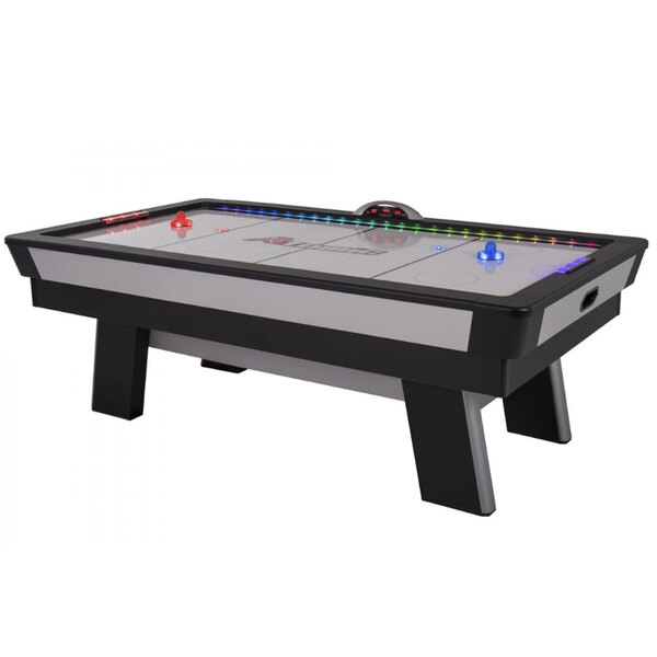 An Atomic air hockey table with black and white details.