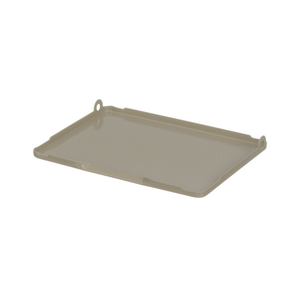 A beige plastic control lid tray with a handle.