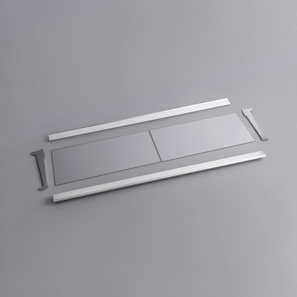 A white rectangular metal frame with two strips and a handle.