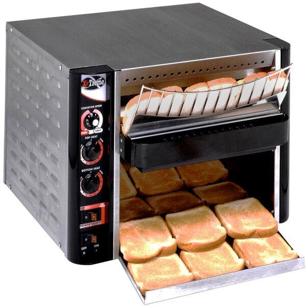 An APW Wyott conveyor toaster with slices of bread inside.