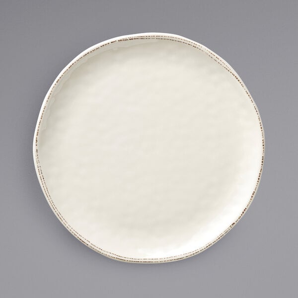 A close up of a white Libbey Farmhouse melamine platter with a rim.