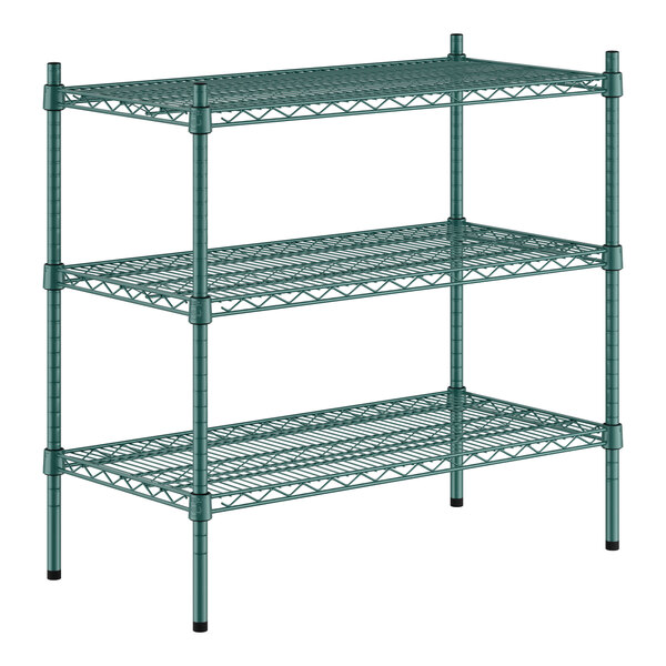 A green metal wire shelving unit with three shelves.