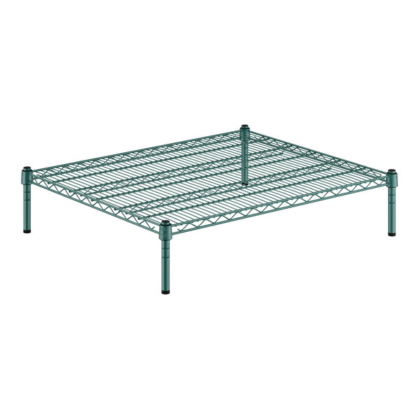 A green wire shelving unit with one shelf.
