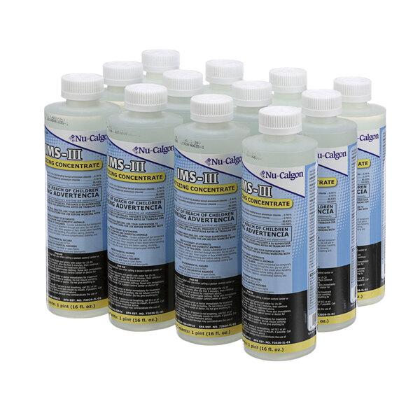 A case of six white bottles of Nu-Calgon IMS-III Sanitizing Concentrate with a white label.
