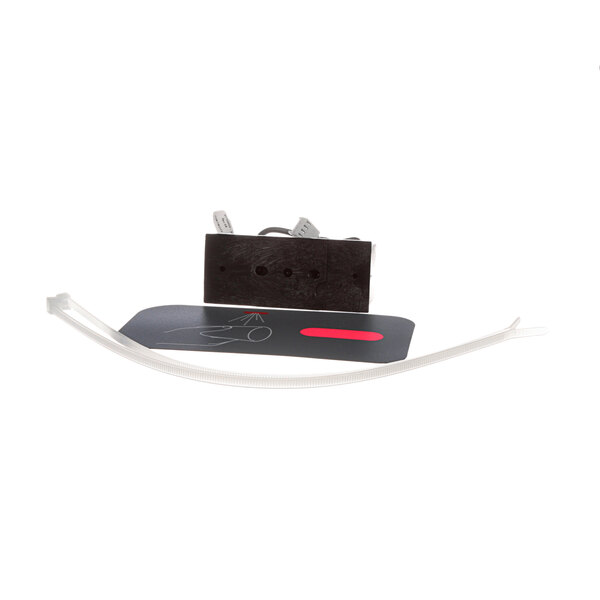 A black rectangular Follett sensor kit with a white strip and red label.