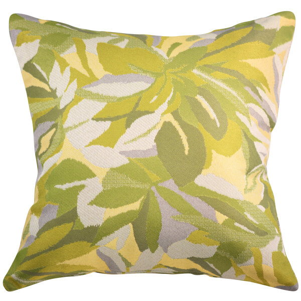 An Astella Pacifica Dewey Green throw pillow with a leaf pattern.