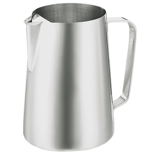 A silver stainless steel Walco Saturn pitcher with a handle.