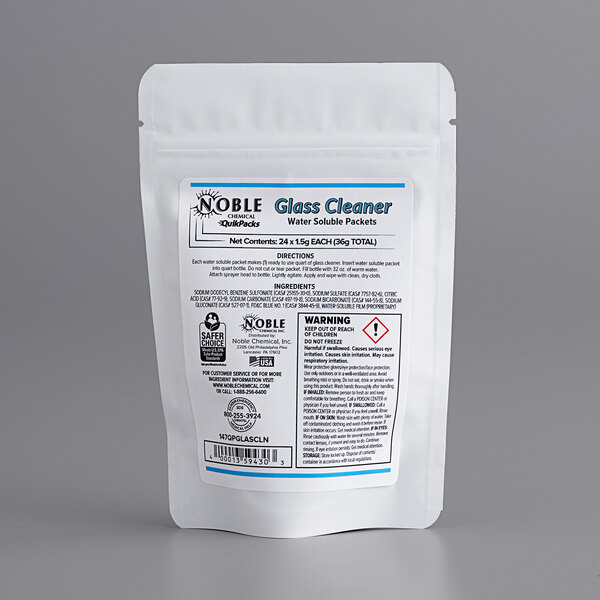 A white bag of Noble Chemical QuikPacks Concentrated Glass Cleaner with a label.