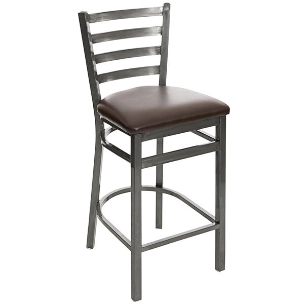 A BFM Seating metal counter height bar stool with a dark brown vinyl seat.
