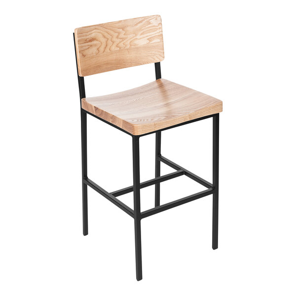 A BFM Seating Memphis bar stool with a black metal frame and natural ash wooden back and seat.